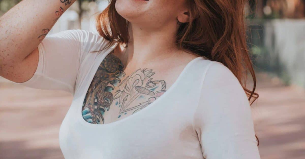 A girl is smiling on a street