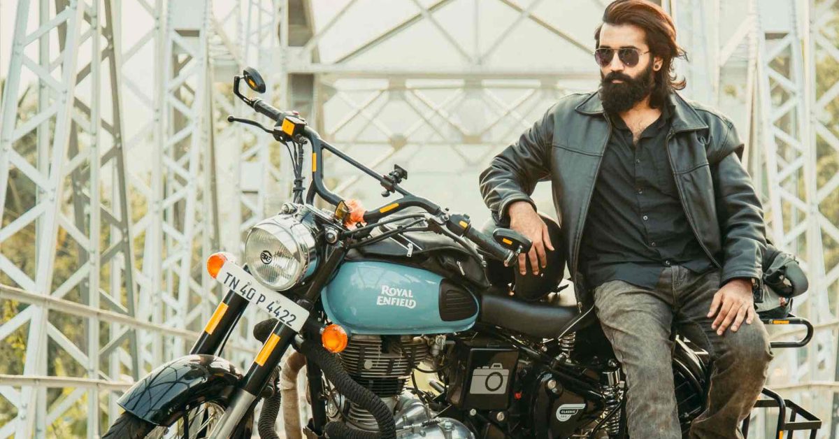 A man with a motorbike